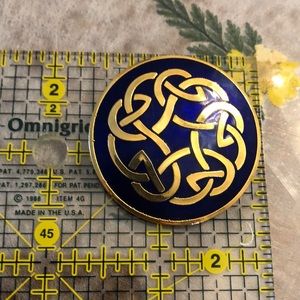 Celtic brooch in blue enamel and gold